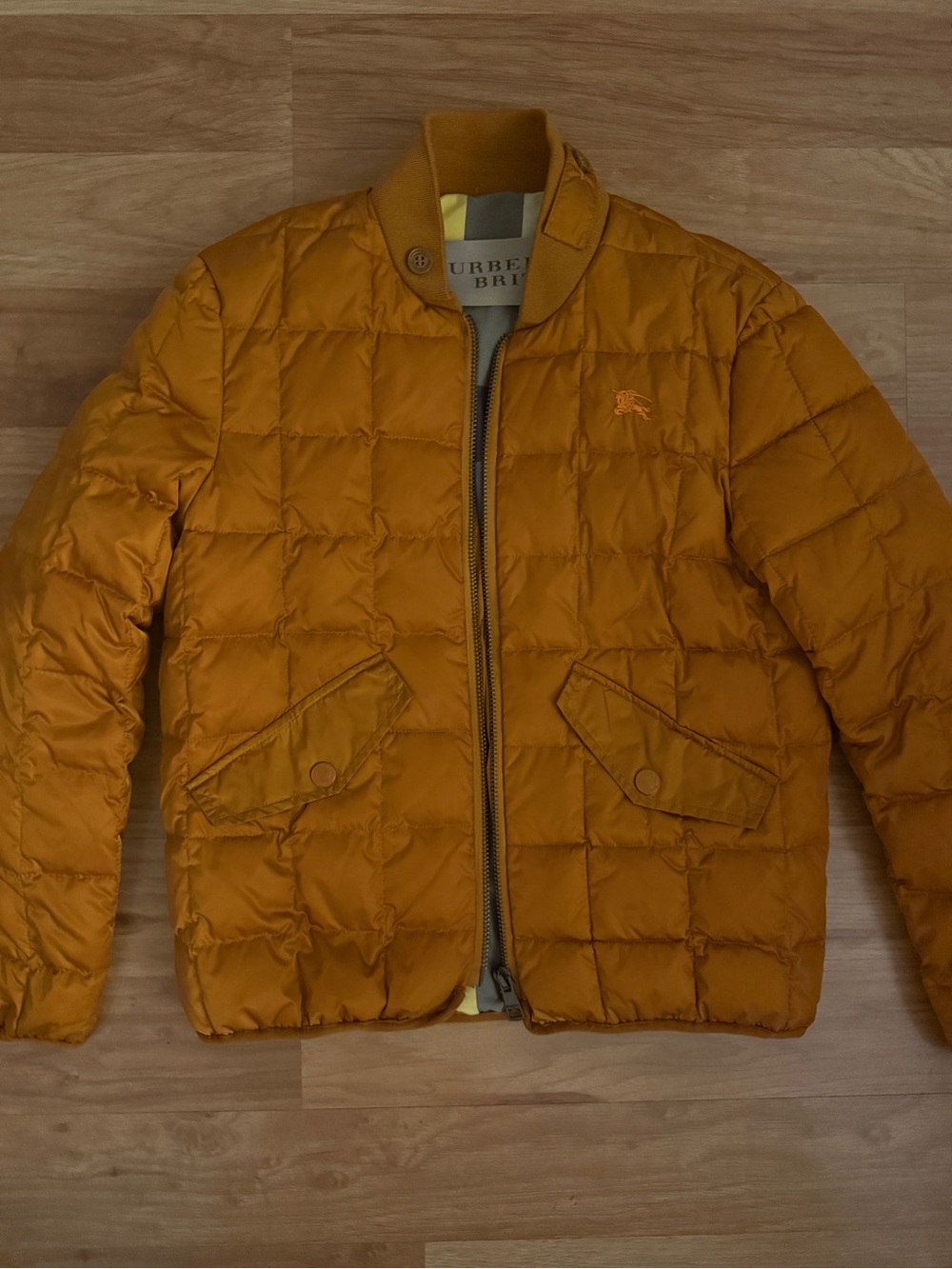 Burberry women’s Quilted Mustard-Orange Puffer Jacket